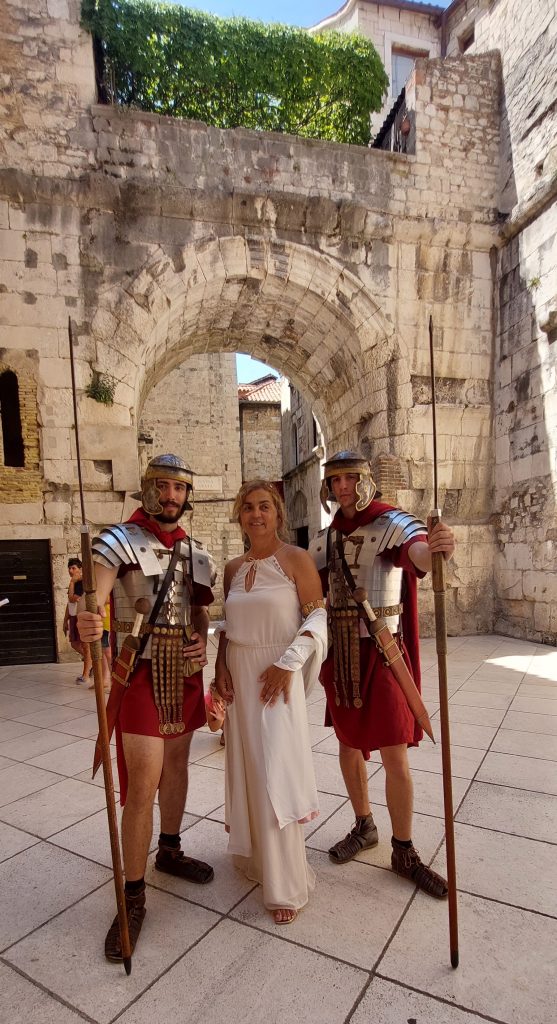 In storytelling tour,empress Priska with roman soldiers on the Golden Gate